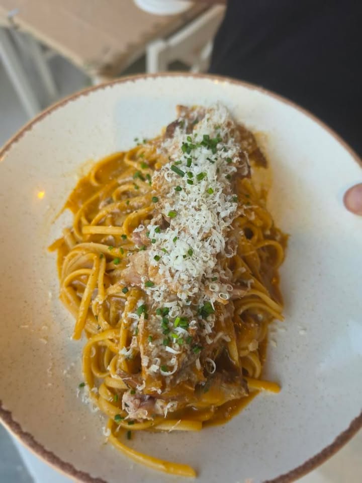 Slow-cooked lemon lamb with linguine